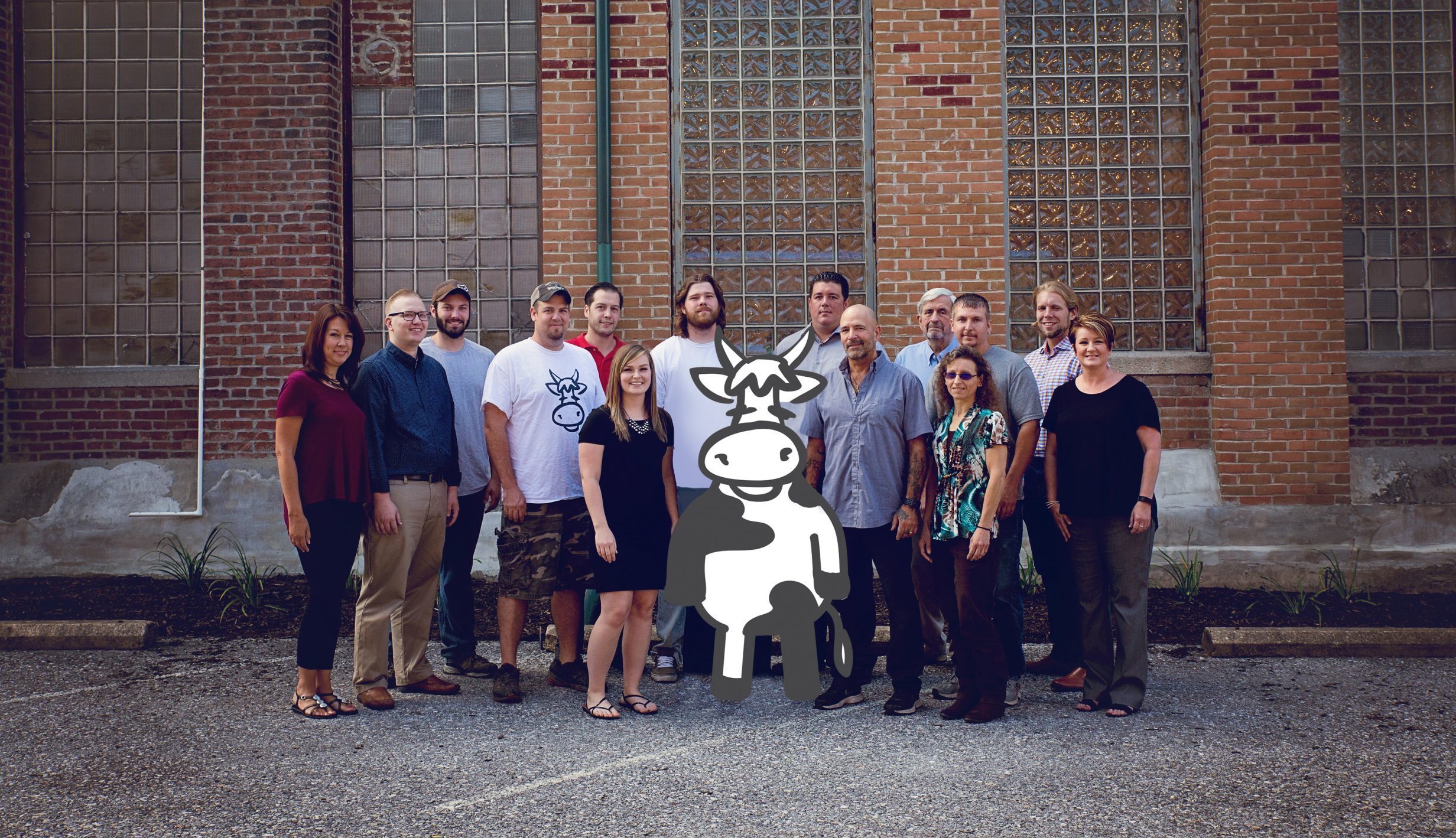 A team photo of the staff at American Micro Industries.