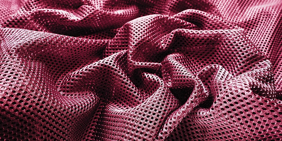 Close up red neoprene fabric